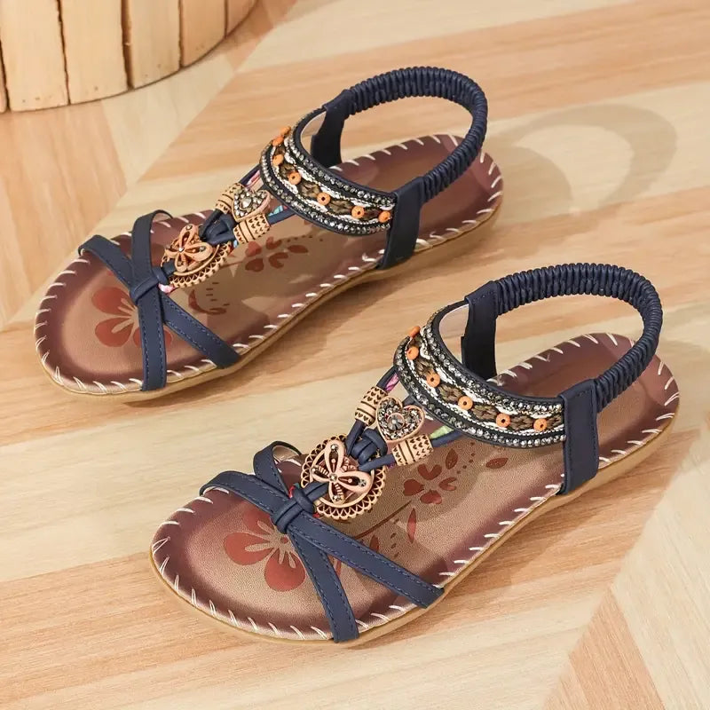 Colella | Sandales élégantes décorées de fleurs et d'un papillon en strass